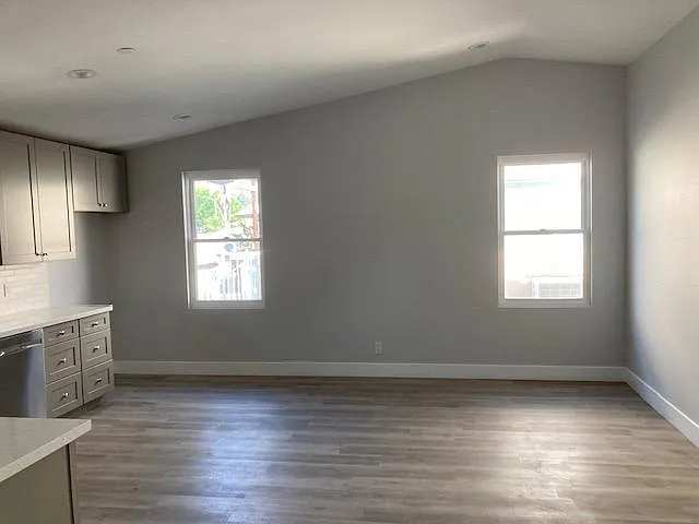 Arched ceilings give an open space feel to the kitchen/family room area.