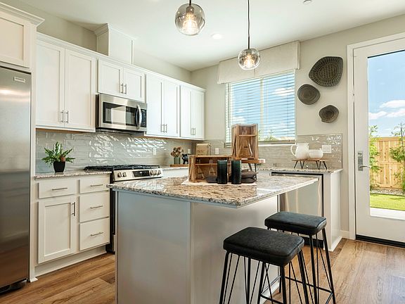Kitchen provides stainless steel appliances an opportunity for beautiful Island with seating