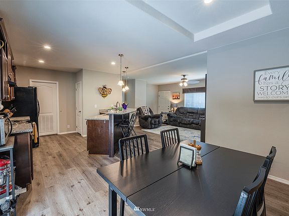 From the dining area showing the kitchen and living room.