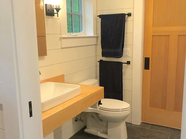 first floor bath - doors lead to bedroom