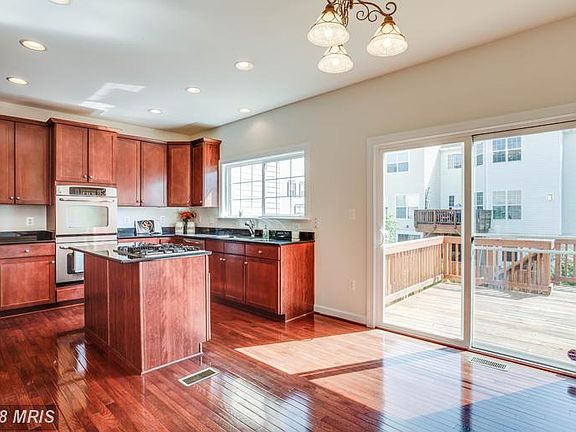 Light-Filled Kitchen Leads to Large Deck