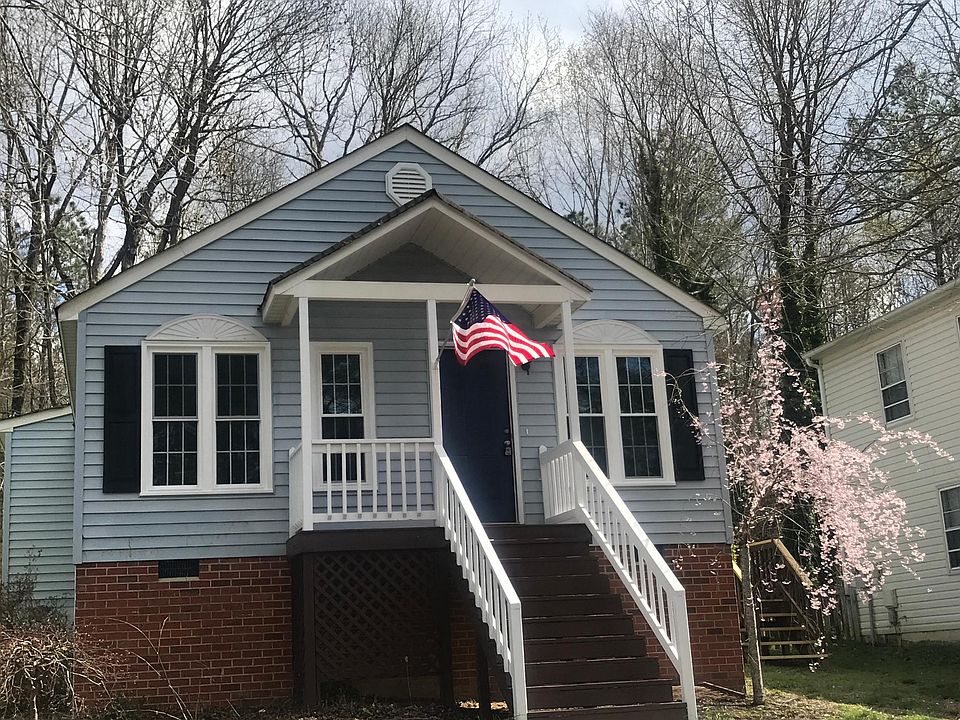 Exterior Front freshly Stained stairs, All New windows will have 2 1/2 inch blinds on all windows, cul-de sac location with large back yard