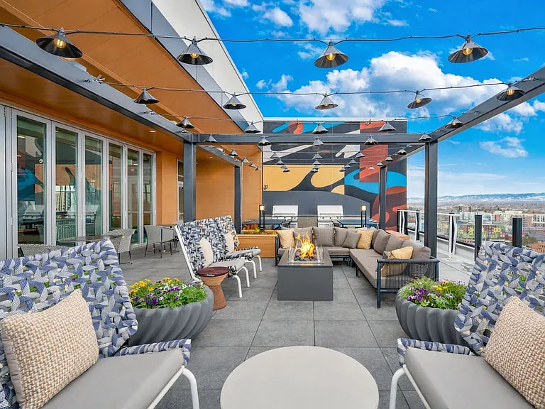 Rooftop deck with fire pit, BBQ grills, and mountain range views