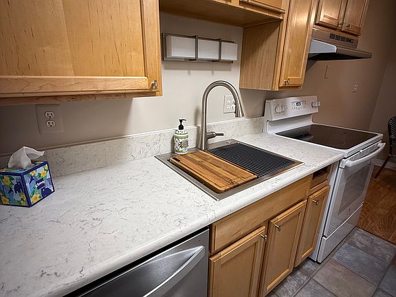 Kitchen - new quartz countertop, new 3-rack dish washer, deep sink, under-sink water filter