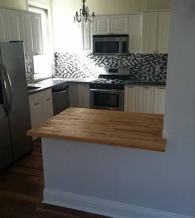 Custom Kitchen w/ Glass M