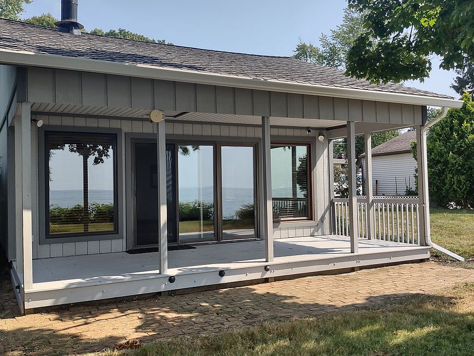 Back coverd porch viewing the lake