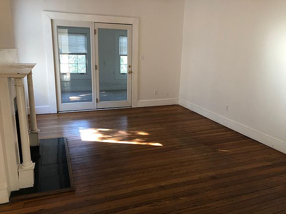 Living Area, glass doors enter bedroom
