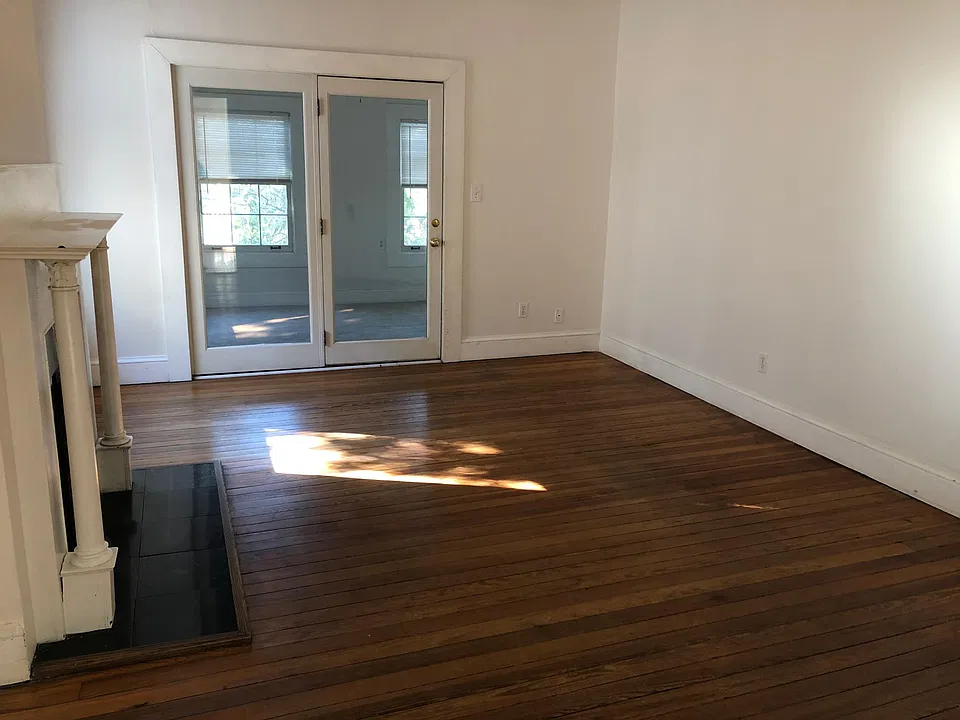 Living Area, glass doors enter bedroom