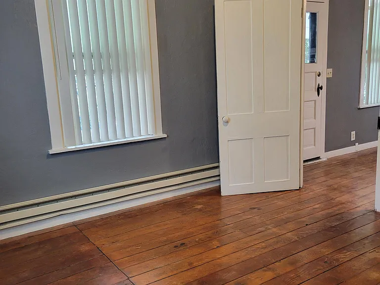 Bedroom with original hardwood floors