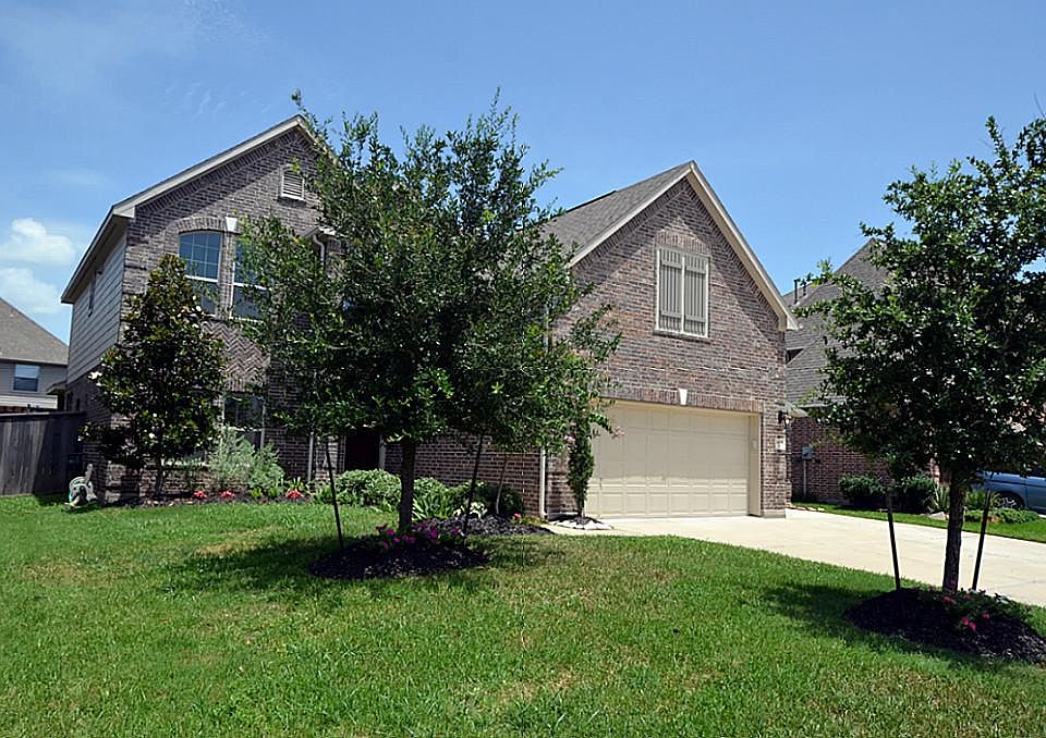 Gorgeous home on quiet cul-de-sac beautifully landscaped with great curb appeal.