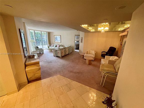 5th image of 3600 Mystic Pointe Dr APT 216