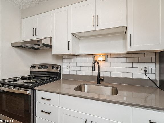 Renovated kitchen with subway tile backsplash