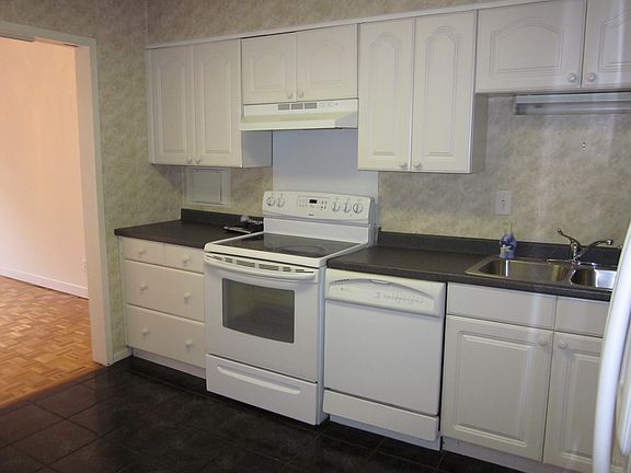White Kitchen w/ Newer Cabin