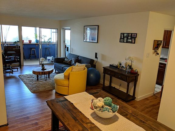 Spacious living room with dining table nook
