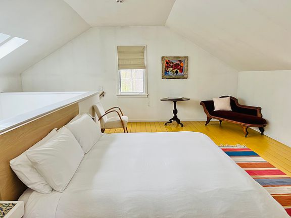 Sleeping loft with king-size bed.