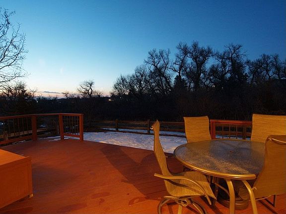 Spacious Deck Overlooks Treed Open Space