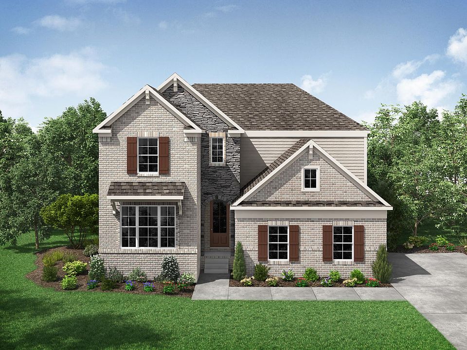 new home with brick, stone and siding