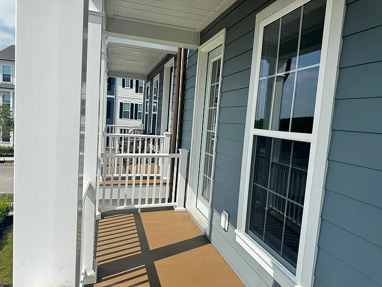 A balcony that allows outdoor sitting time in the beautiful spring summer and falls of cranberry.