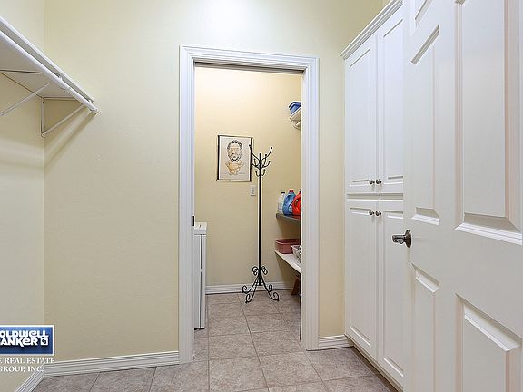 Locker/storage area off foyer