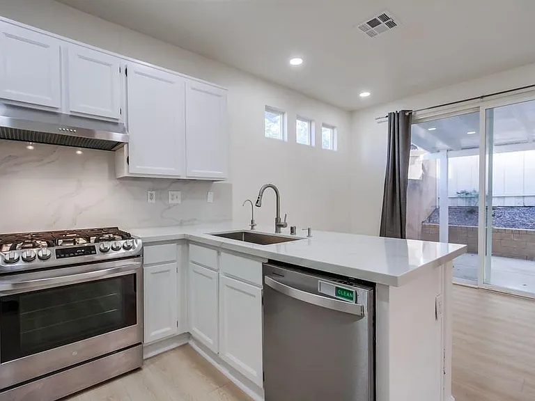 11655-8 Compass Point Dr N — Photo 26