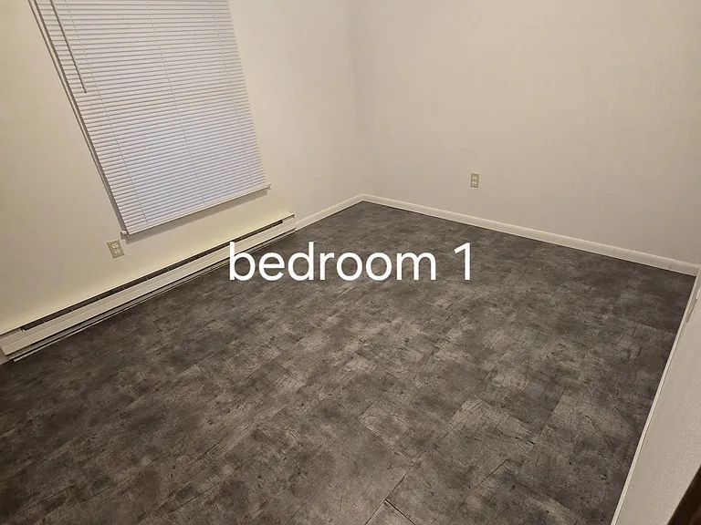 Master bedroom doorway to back corner of room.