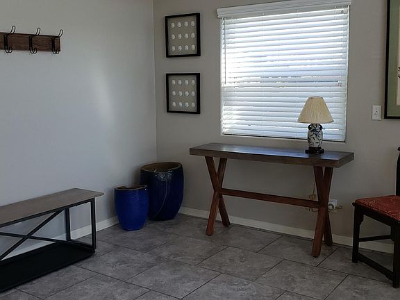 Large Entry hall with front door intercom, large window, open concept to the Living room....