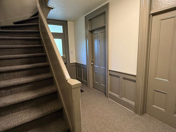 Interior ground floor landing, hallway and stairs.