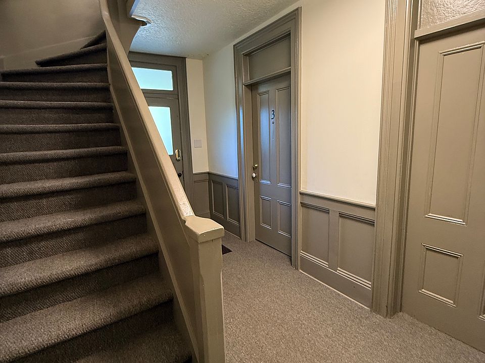 Interior ground floor landing, hallway and stairs.
