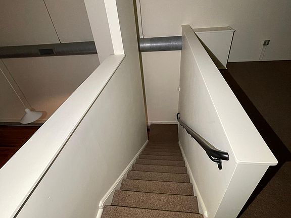 Stairs to the loft bedroom.