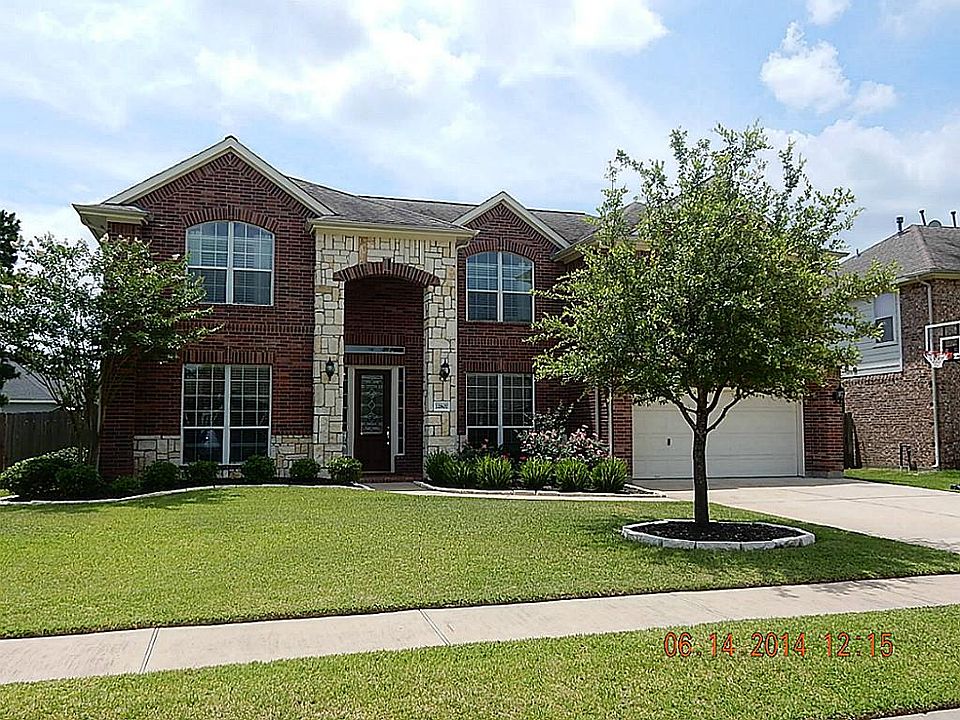 Lovely updated home with nice curb appeal and a stone elevation.