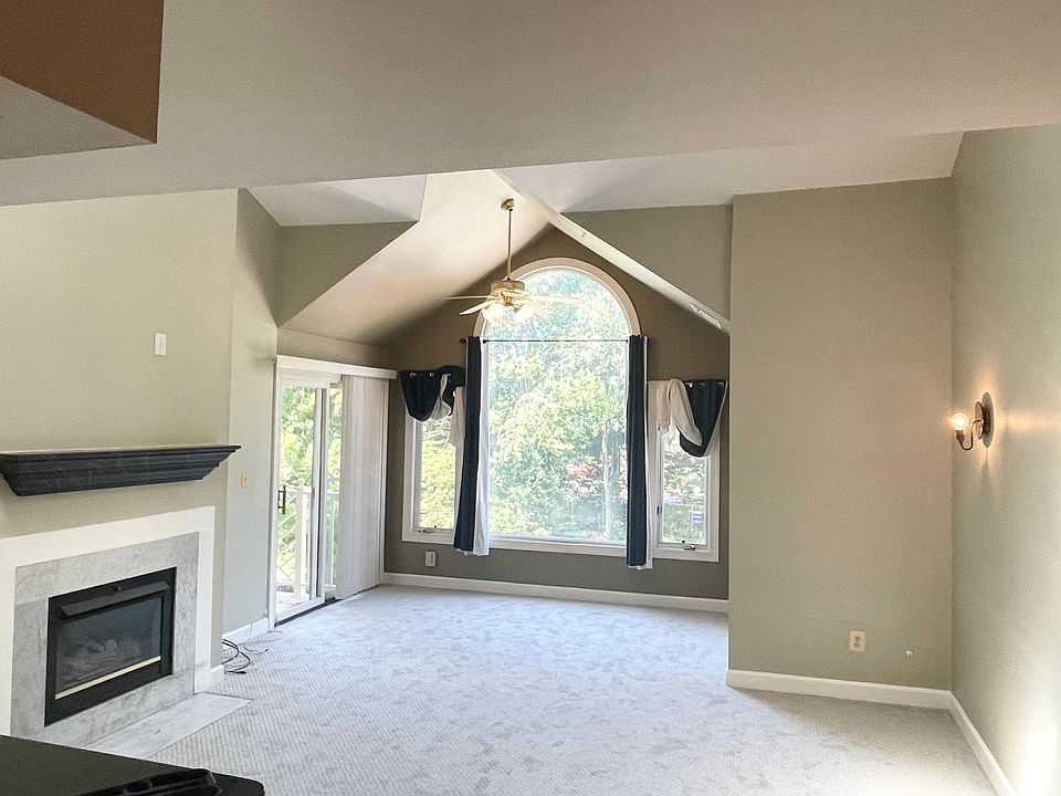 Living room with vaulted ceilings