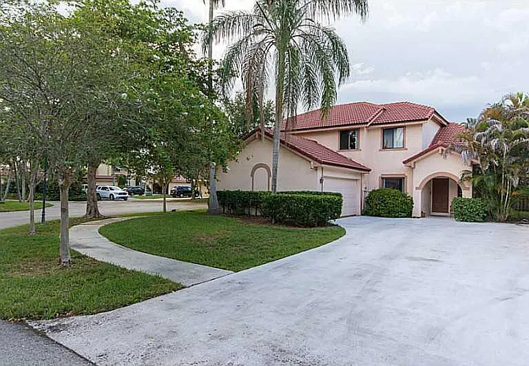 9561 NW 18th Ct — Photo 1