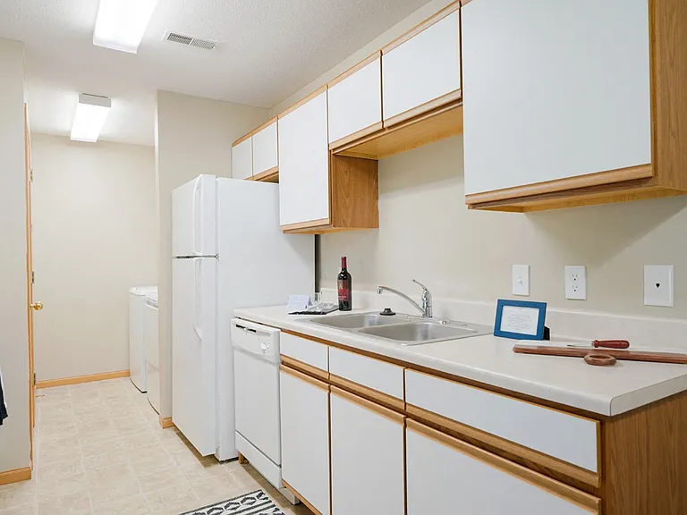 Our kitchens are thoughtfully designed with ample cabinetry and appliances for everyday convenience.