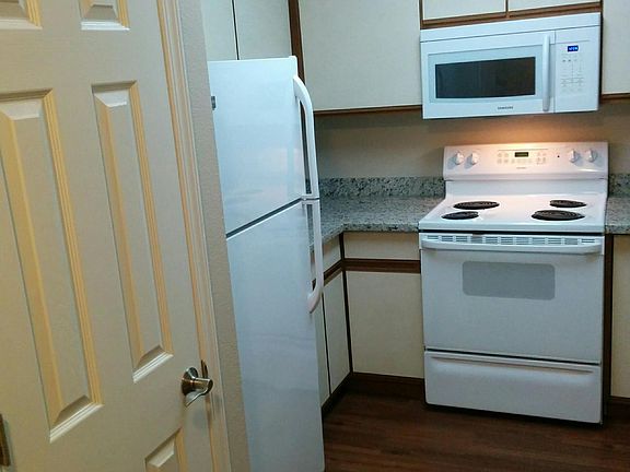 Self cleaning oven, outside vented microwave, ice maker