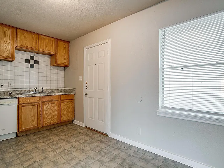 Kitchen with door to balcony