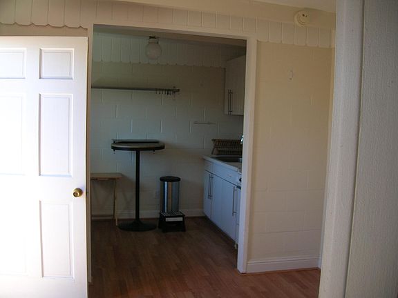 Front room looking at kitchen area