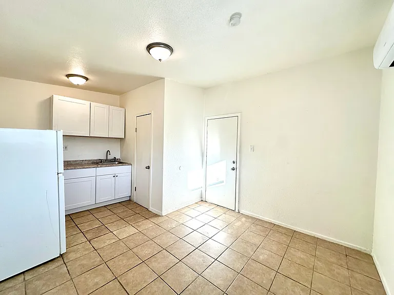 Studios and 1 bedrooms that include all utilities! Off Street Parking and Tile Flooring! — Photo 8
