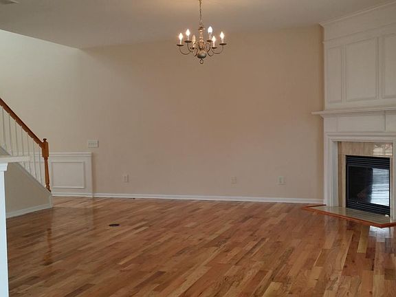 Living room. Hardwood Floors. Newly Painted.