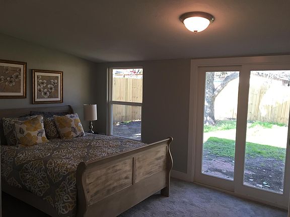 Bedroom looks out onto your private backyard