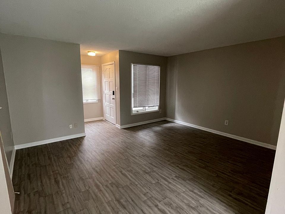 Great room, plenty of room for a full size sofa and media area, fresh new paint and brand new luxury vinyl flooring throughout!