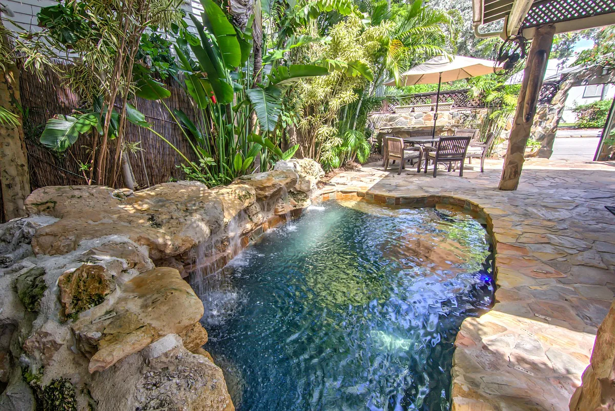pool and patio with outdoor dining table - 1220 Virginia St