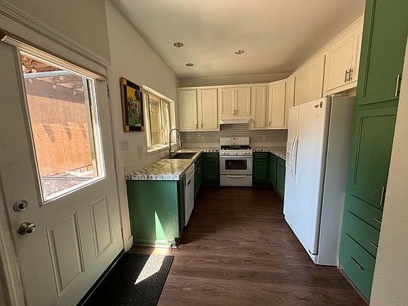 Bright kitchen with plenty of storage and pantry