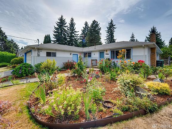 Side view with mature garden