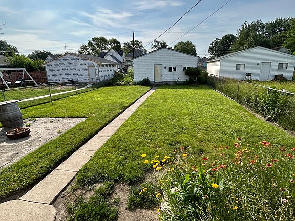 Back yard leading to garage
