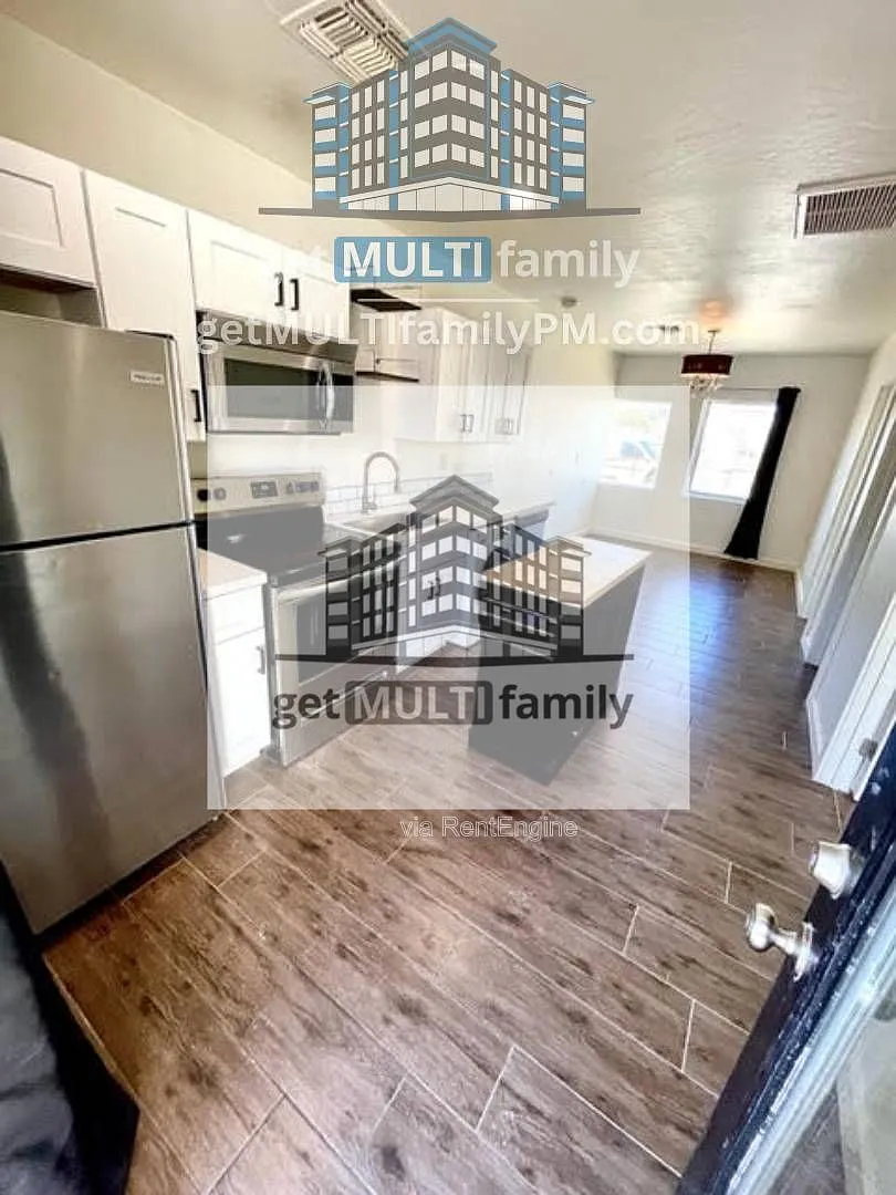 Building Photo - 1402 E McKinley St #B