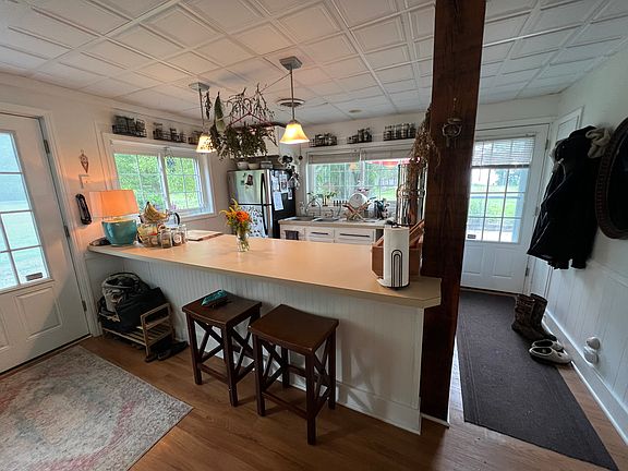 Open concept kitchen and herbal apothecary.