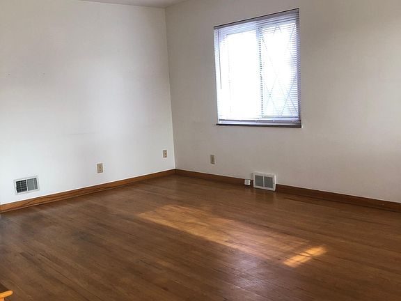 Nice sized living room with lots of window light