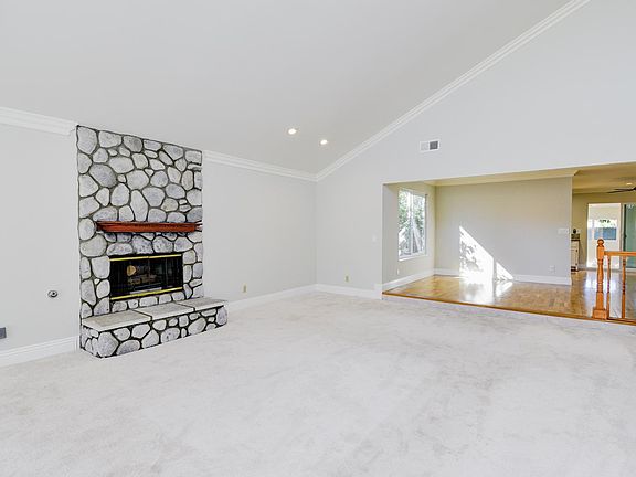 Look at that fire place and the Cathedral ceiling!