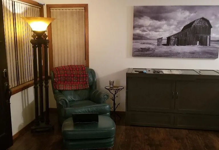 left side of living room as you walk into home.