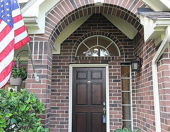 Beautiful entrance to this brick home.